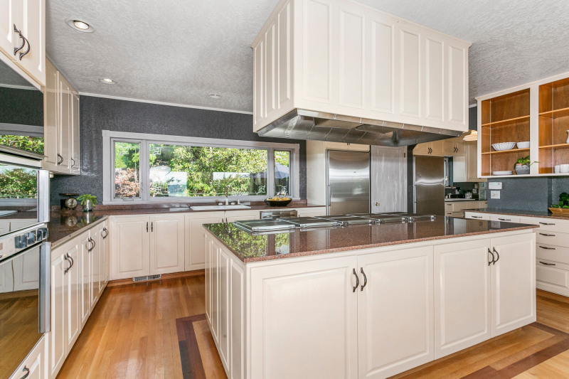 Kitchen features 5 cooktop Gaggenau stove, Gaggenau double ovens, separate Sub Zero refrigerator and Sub Zero freezer, storage galore.