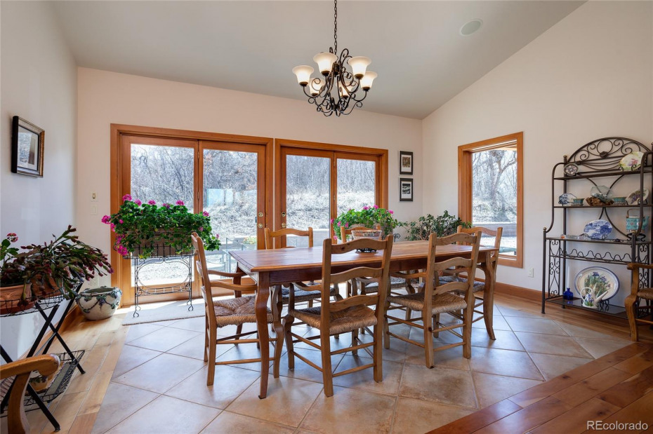comfortable dining area with a walk out to outdoor dining area