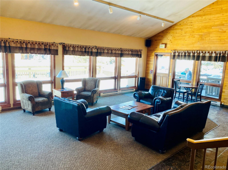 The clubhouse.  Large gathering room for the teenagers and adults to relax after a day of skiing. Enjoy a happy hour or grab a cup of coffee from the coffee bar.  Relax by the fire or have lunch in the summer months on the front deck.