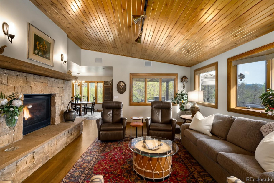 Comfortable living area with views, white oak floors, tongue and groove ceilings