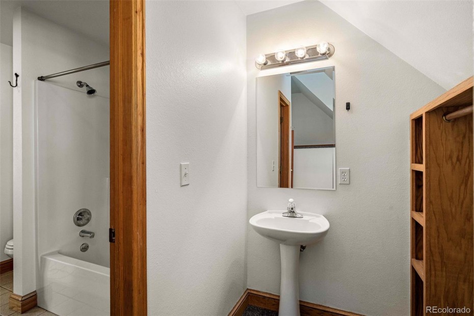Shared tub/shower/toilet with private sink