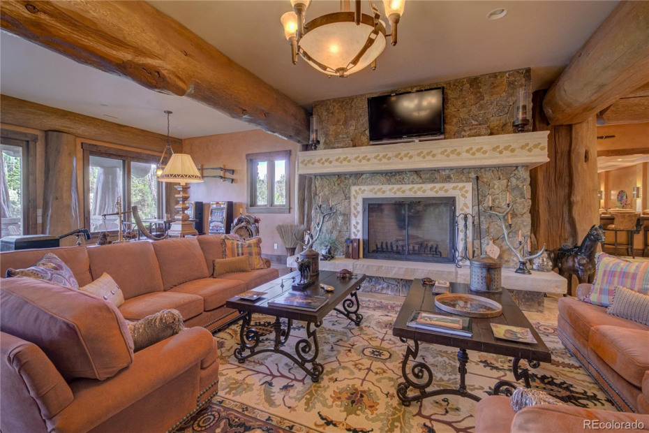 Enjoy Some Time In Front Of The Fireplace In The Family Room