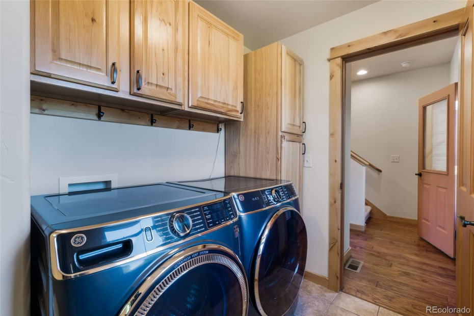 Laundry Room with New Washer and Dryer