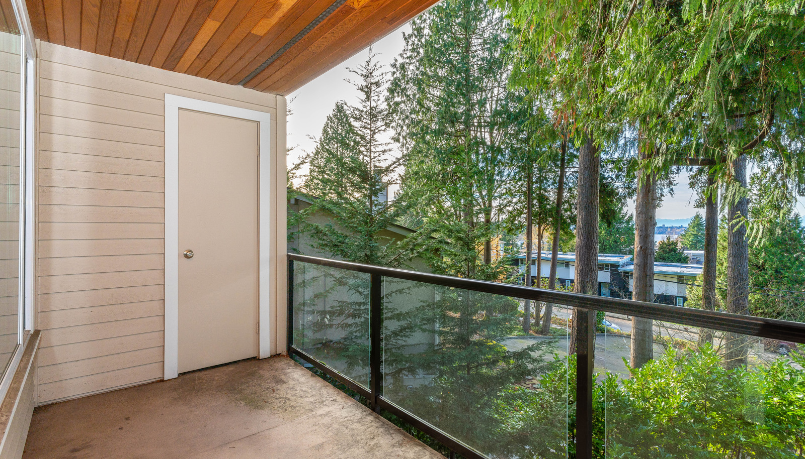 Enjoy the covered deck with a peek-a-boo lake view!